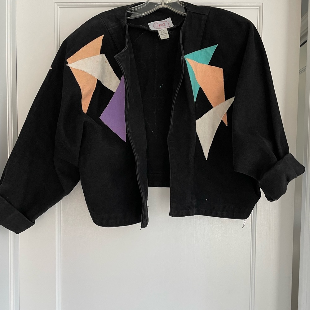 Blk denim no closure jacket patches on back as well size large